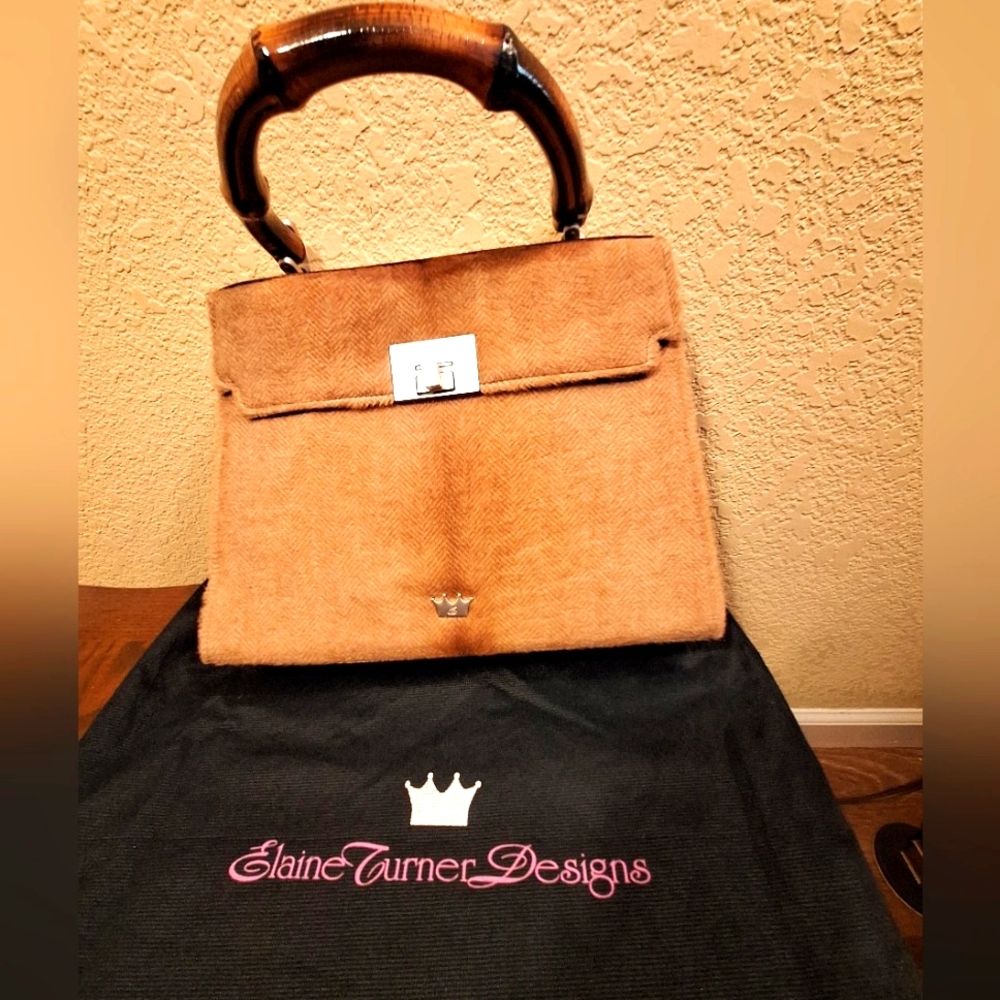 Elegant Brown Handbag with Bamboo Handle from Elaine Turner of Houston.